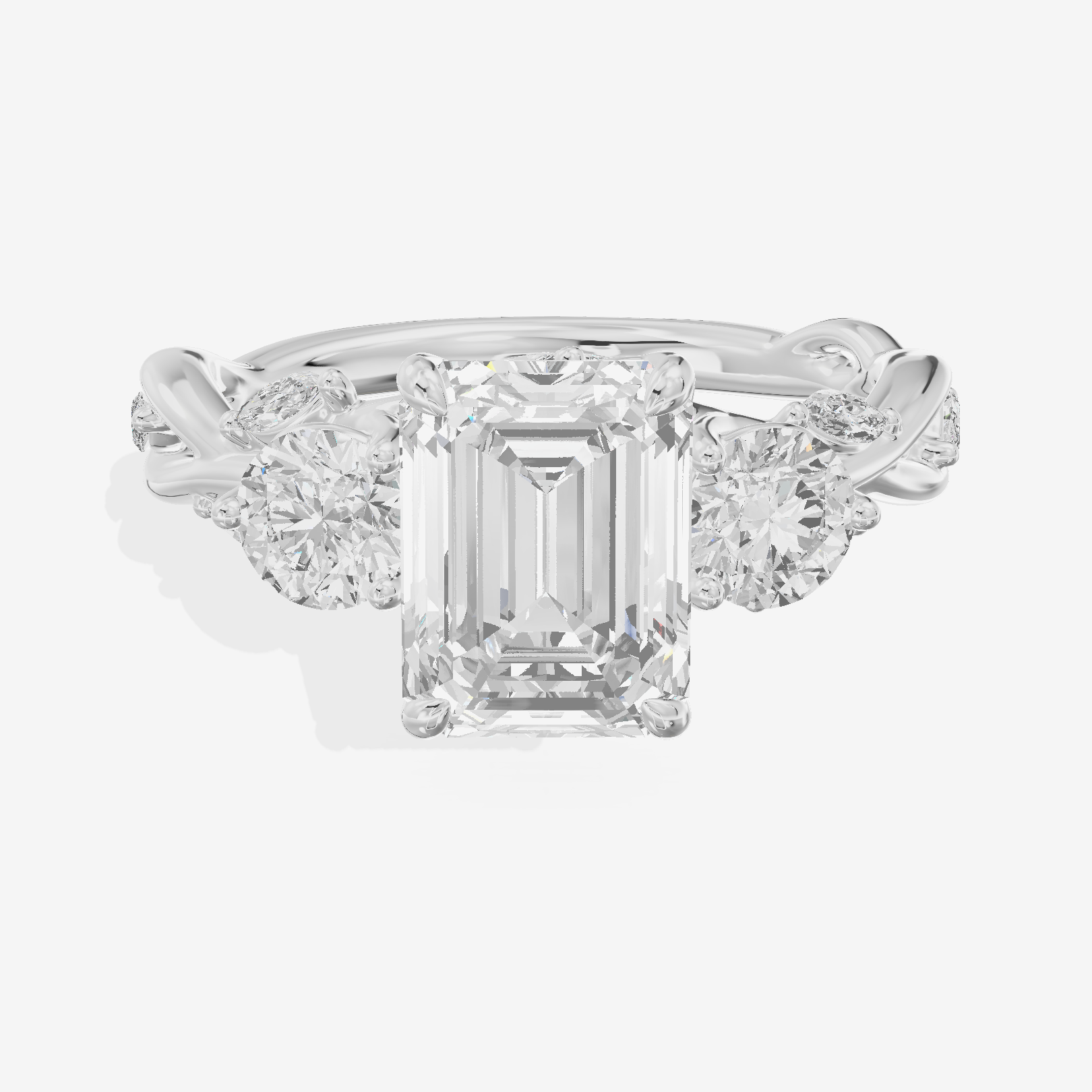 Modern Vowsae Three Stone Emerald Engagement Ring (3/4 ct. tw.) in 18K White Gold