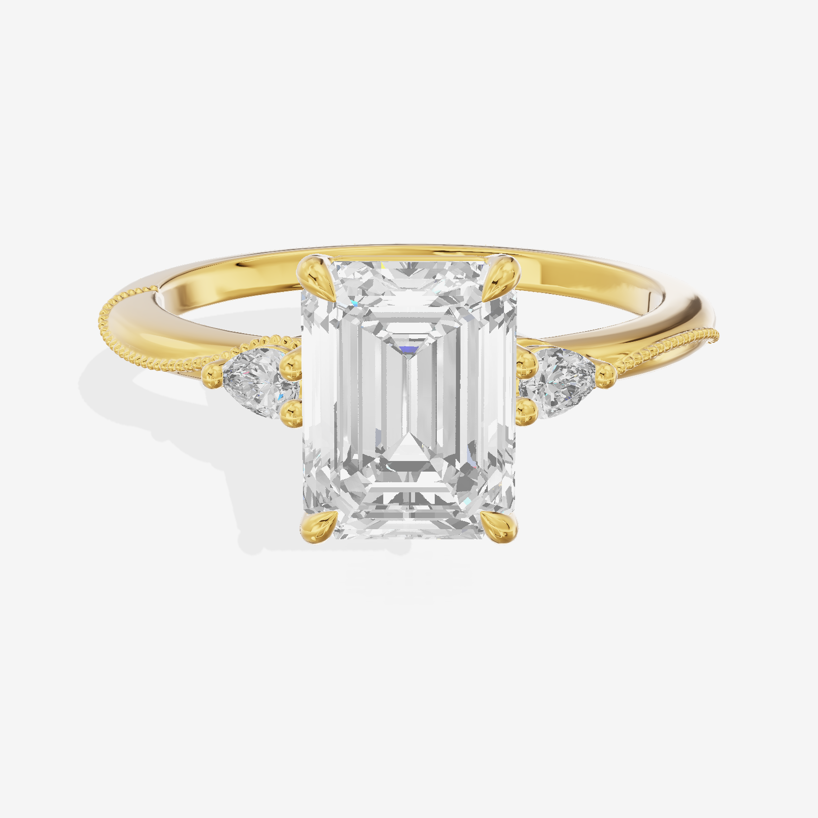 Promezza Three Stone Emerald Engagement Ring (1/10 ct. tw.) in 14K Yellow Gold