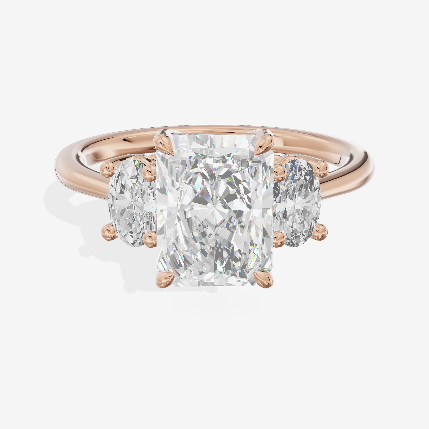 Modern Coeurine Three Stone Radiant Engagement Ring (1/2 ct. tw.) in 18K Rose Gold