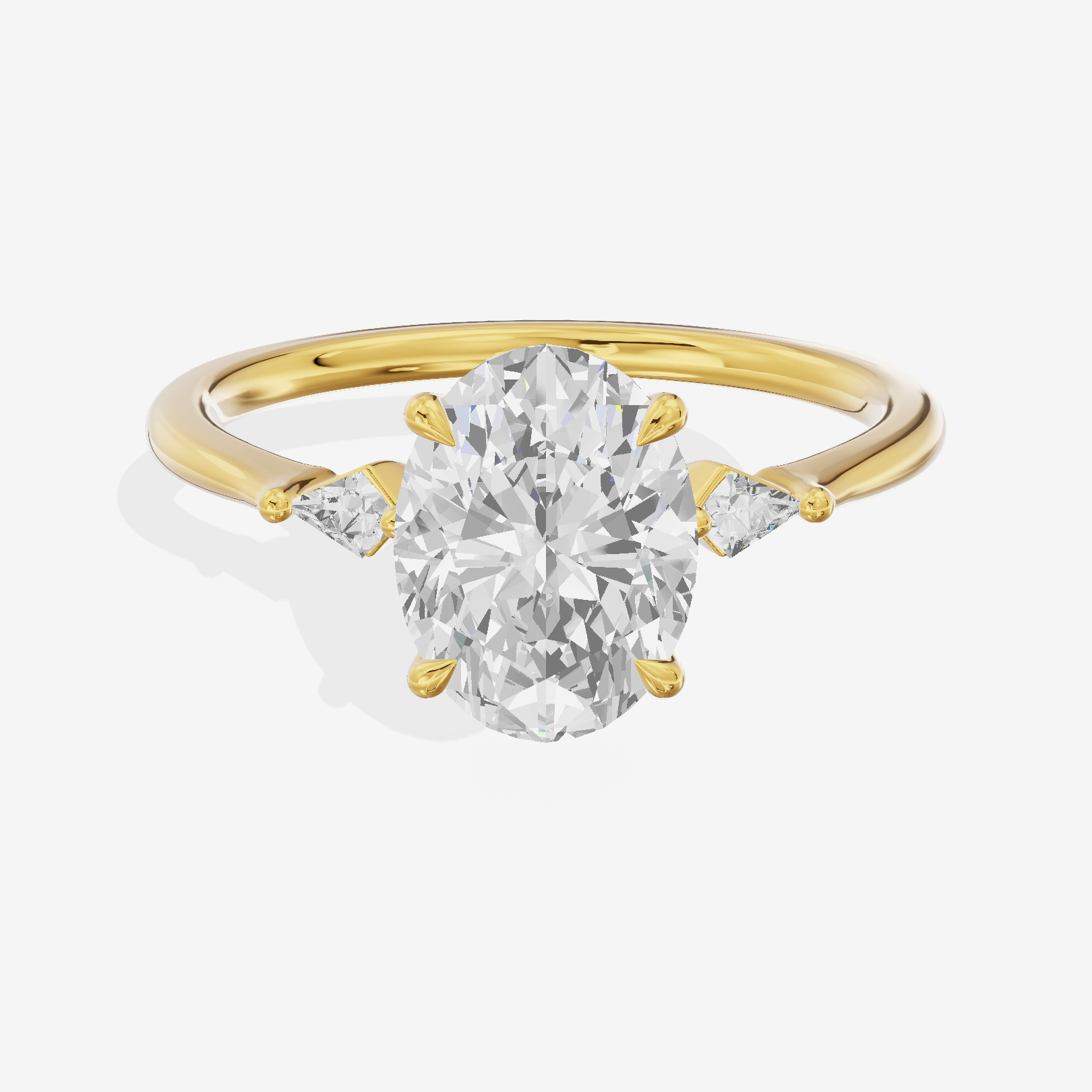 Petite Triade Oval Three Stone Engagement Ring (1/15 ct. tw.) in 14K Yellow Gold