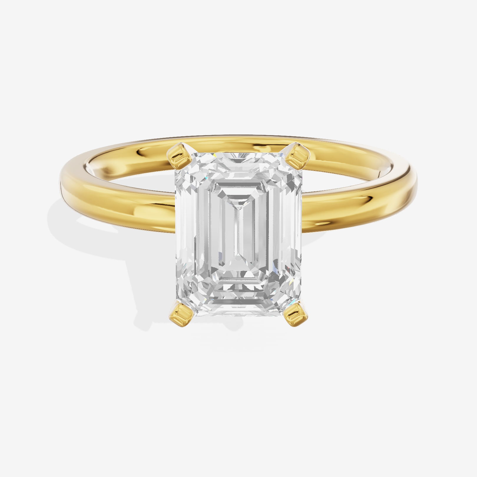 Sincere 2mm Emerald Solitaire Engagement Ring in 18K Yellow Gold