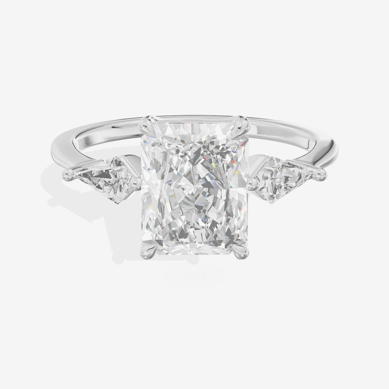 Luxe Maia Three Stone Radiant Engagement Ring (1/3 ct. tw.) in Platinum