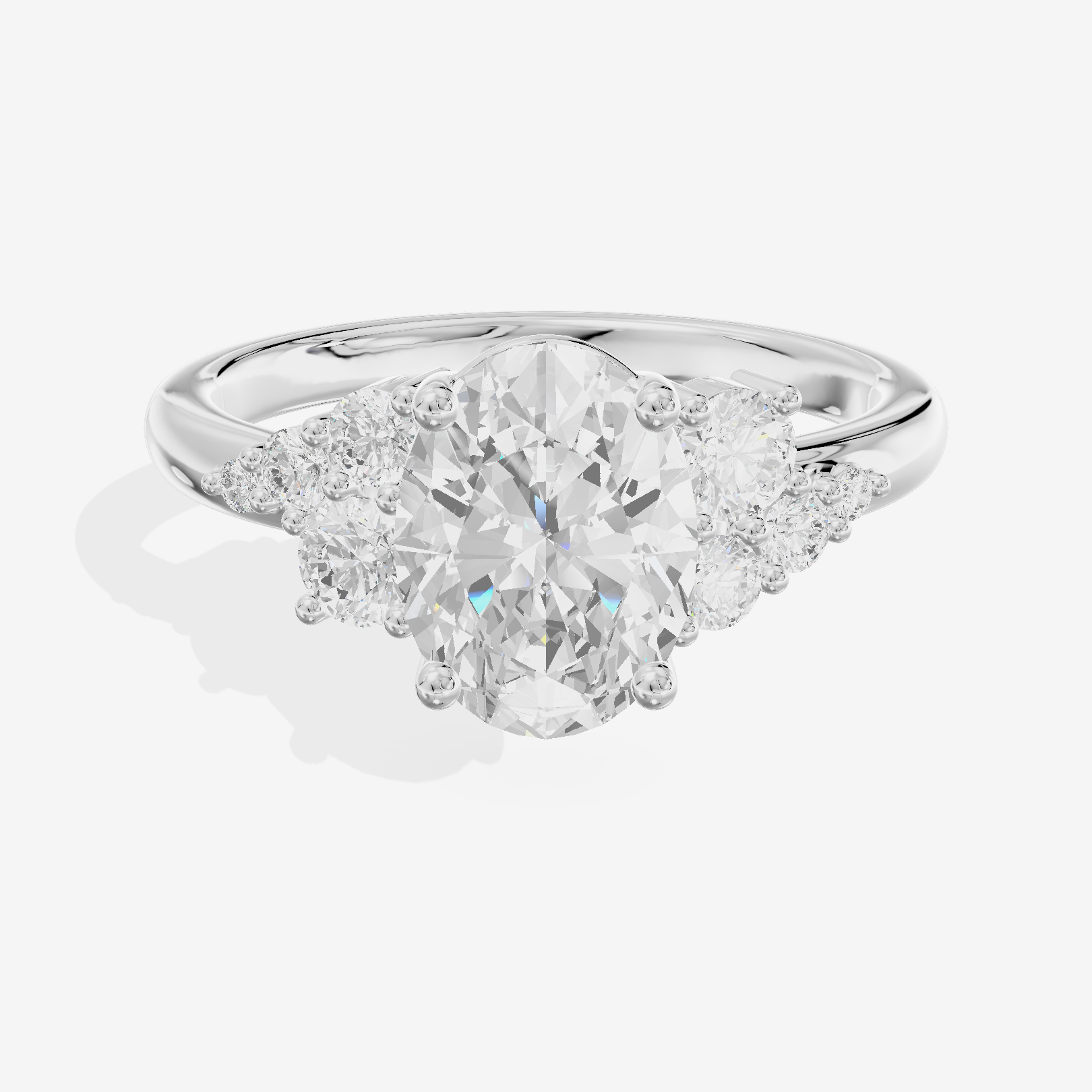 Modern Tender Oval Engagement Ring with Side Stones (1/3 ct. tw.) in 14K White Gold