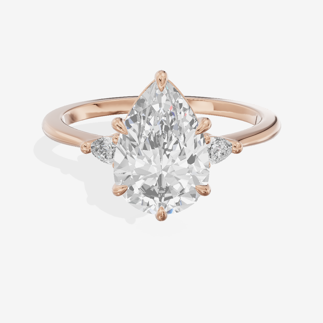 Coeurine Three Stone Pear Engagement Ring (1/8 ct. tw.) in 18K Rose Gold