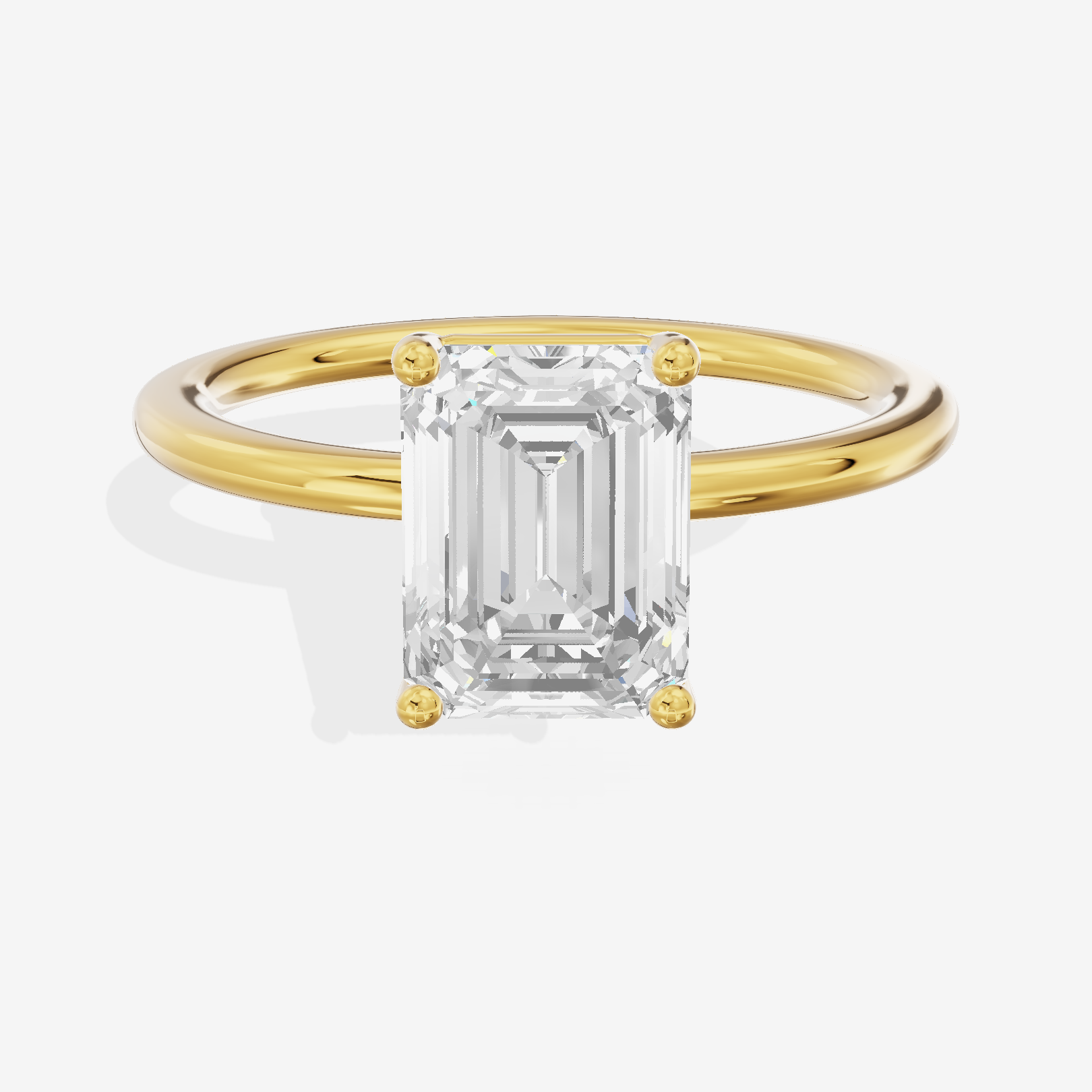 Crowned Vowsae 1.5mm Emerald Solitaire Engagement Ring in 18K Yellow Gold