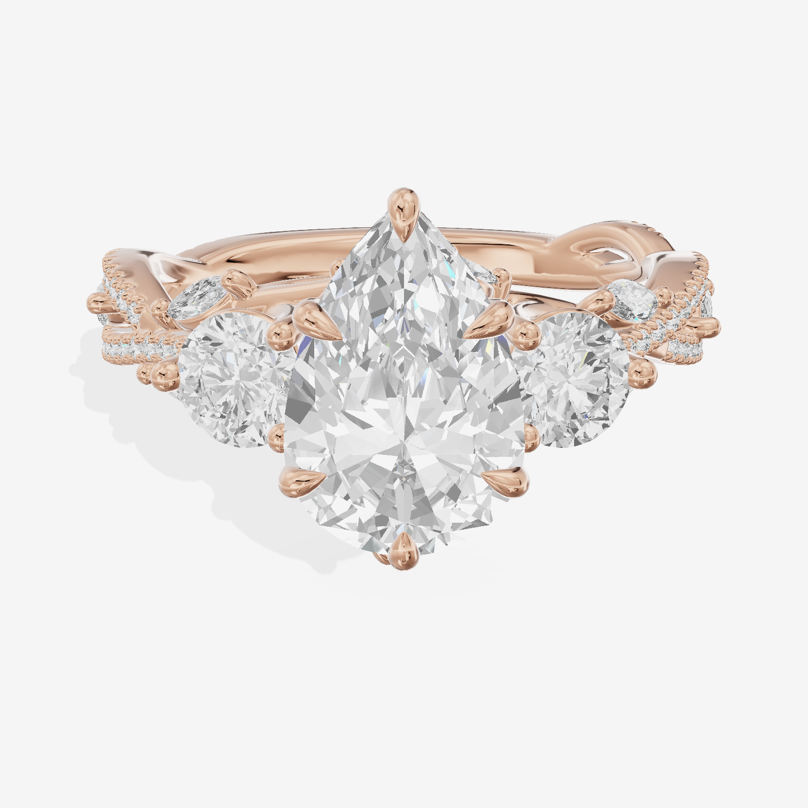 Classic Coeurine Three Stone Pear Engagement Ring (3/5 ct. tw.) in 18K Rose Gold