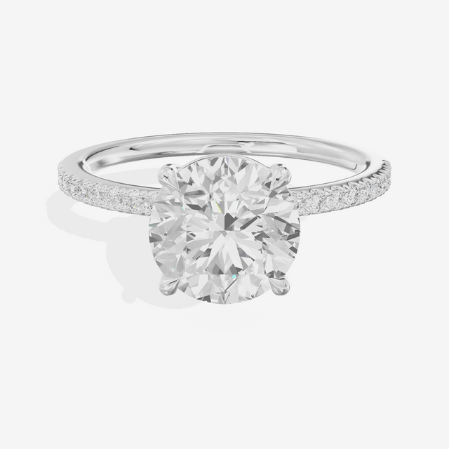 Tender Vowsae Round Engagement Ring with Side Stones (1/8 ct. tw.) in 18K White Gold