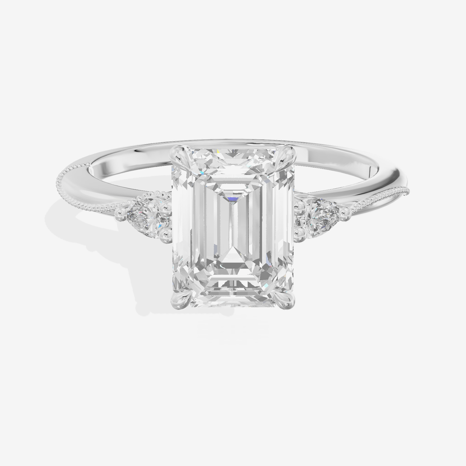Promezza Three Stone Emerald Engagement Ring (1/10 ct. tw.) in 14K White Gold