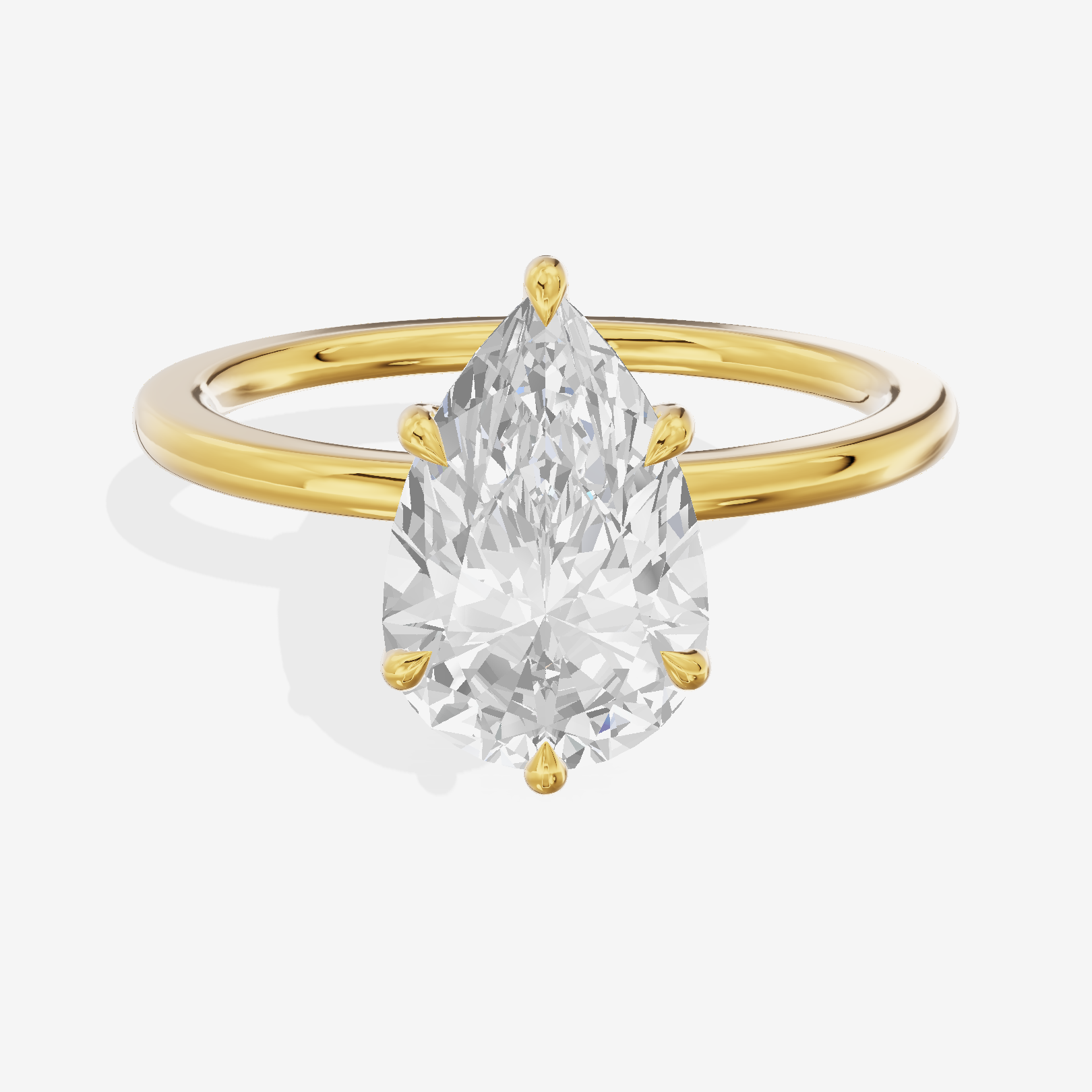 Coeurine Hidden Halo Pear Engagement Ring (1/20 ct. tw.) in 18K Yellow Gold