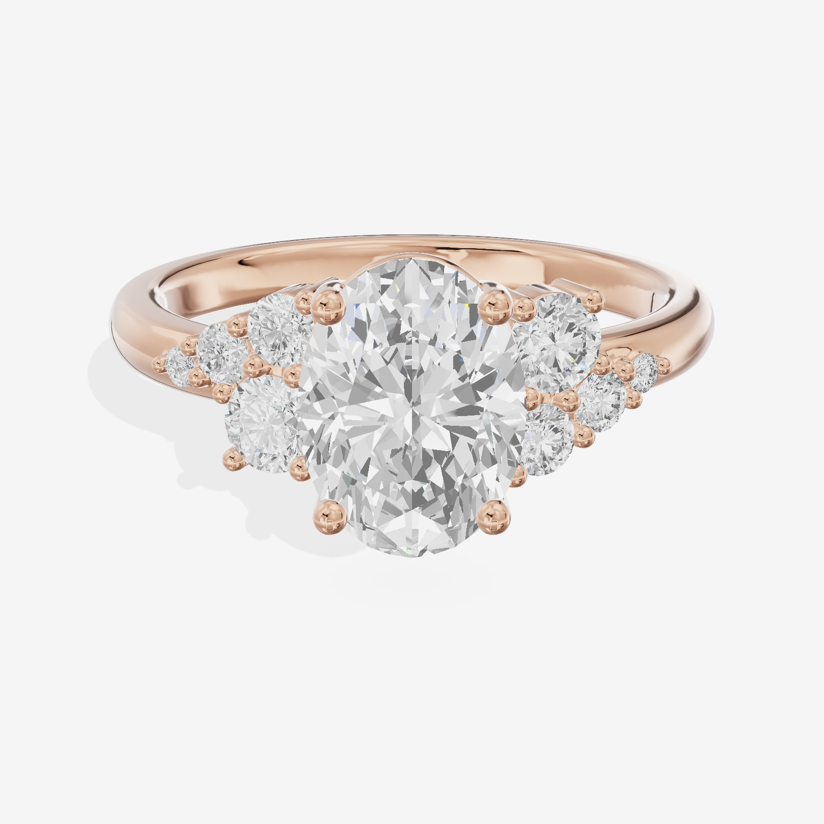 Modern Tender Oval Engagement Ring with Side Stones (1/3 ct. tw.) in 14K Rose Gold
