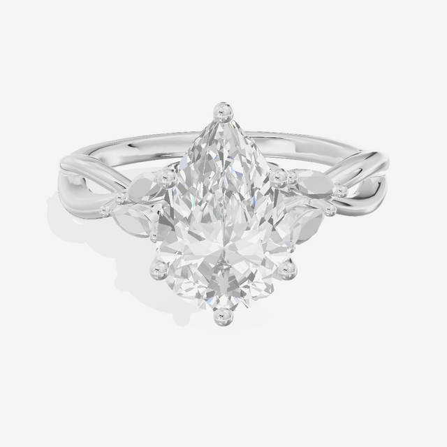 Modern Sincere Pear Engagement Ring with Side Stones in Platinum