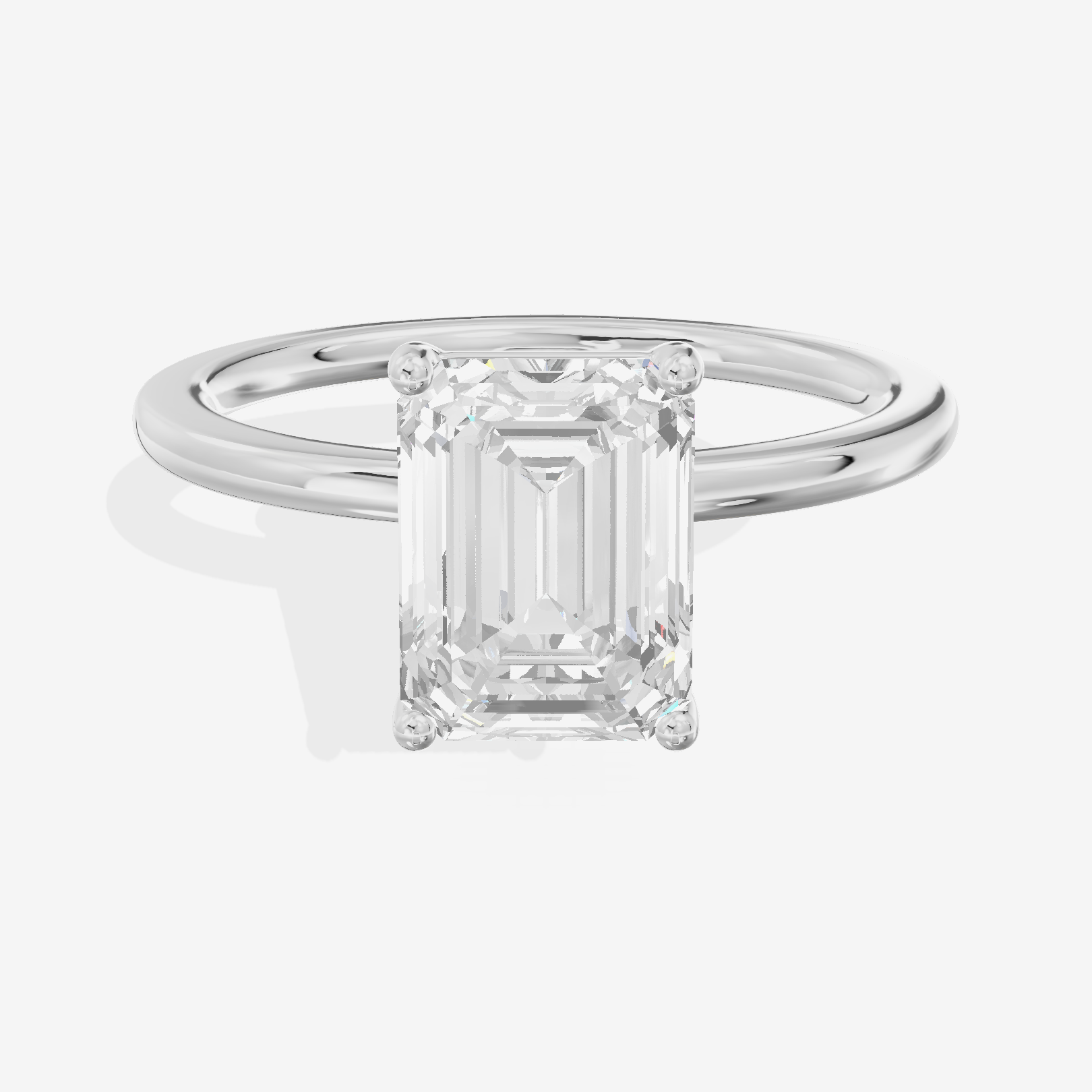 Selenia Solitaire 1.5mm Emerald Engagement Ring in 18K White Gold