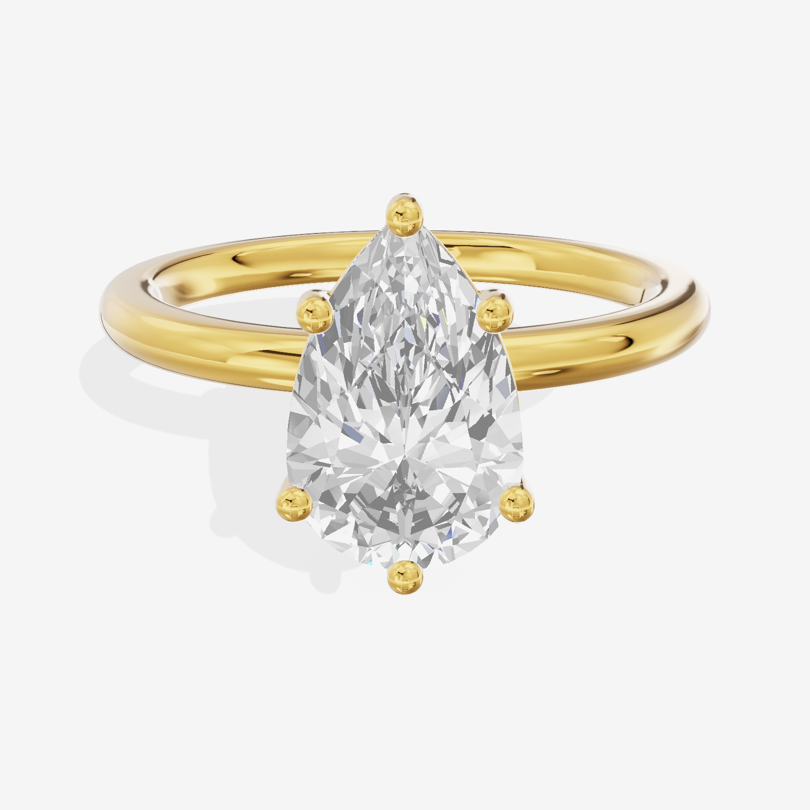 Tender 2mm Pear Solitaire Engagement Ring in 18K Yellow Gold