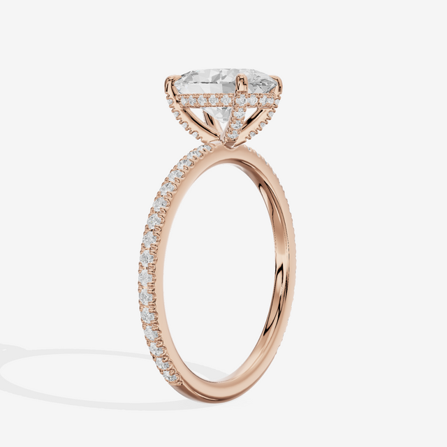 Lustrous Sincere Oval Engagement Ring with Side Stones (1/3 ct. tw.) in 14K Rose Gold