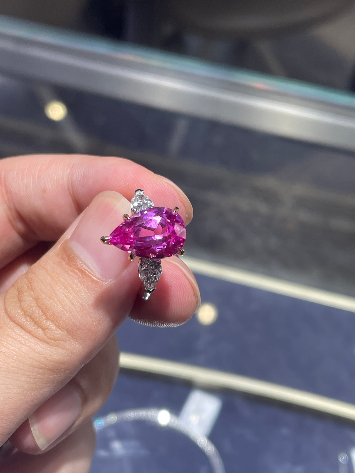 For anabanana three stone style ring two tone 18 k main stone pink sapphire 6.235ct pear cut side stone lab diamond 0.832ct