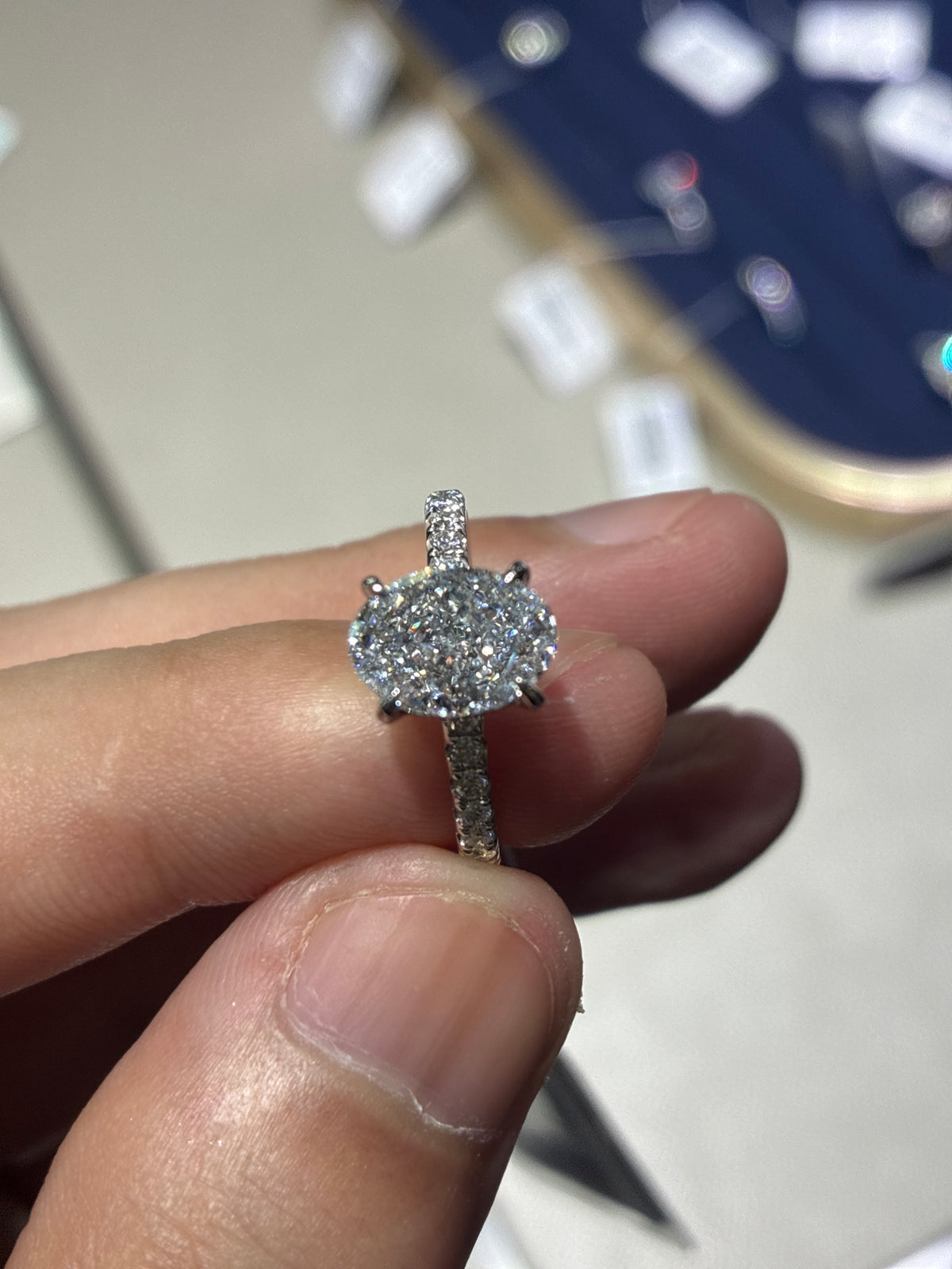18k white gold 2.29 carat oval hidden halo diamond ring