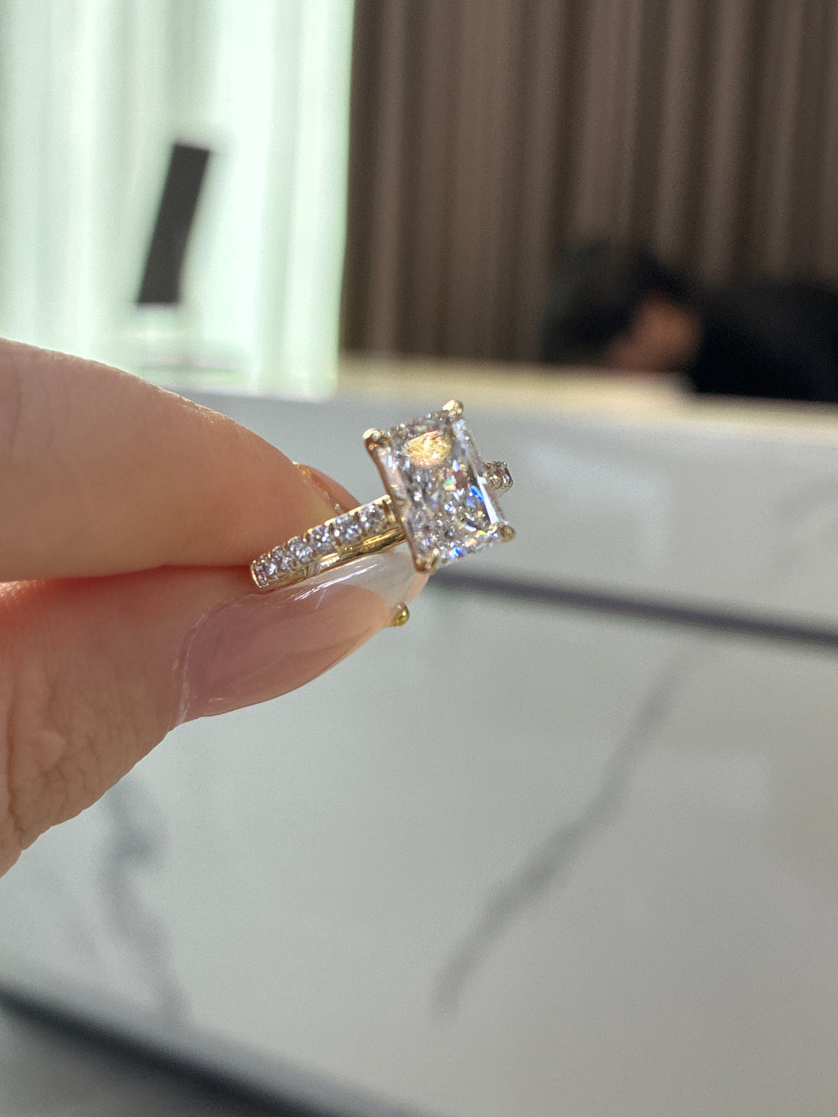 For cris 14k yellow gold radiant cut E/vs1 main stone 2.01ct side stone 0.307 ct