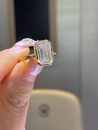 For sam 14k gold bezel  emerald cut ring total 3.178