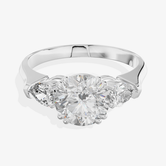 18K White Gold 1.07 Carat Round Brilliant Cut Lab-Grown Diamond D VVS2 Ring with Pear Shape Side Stones