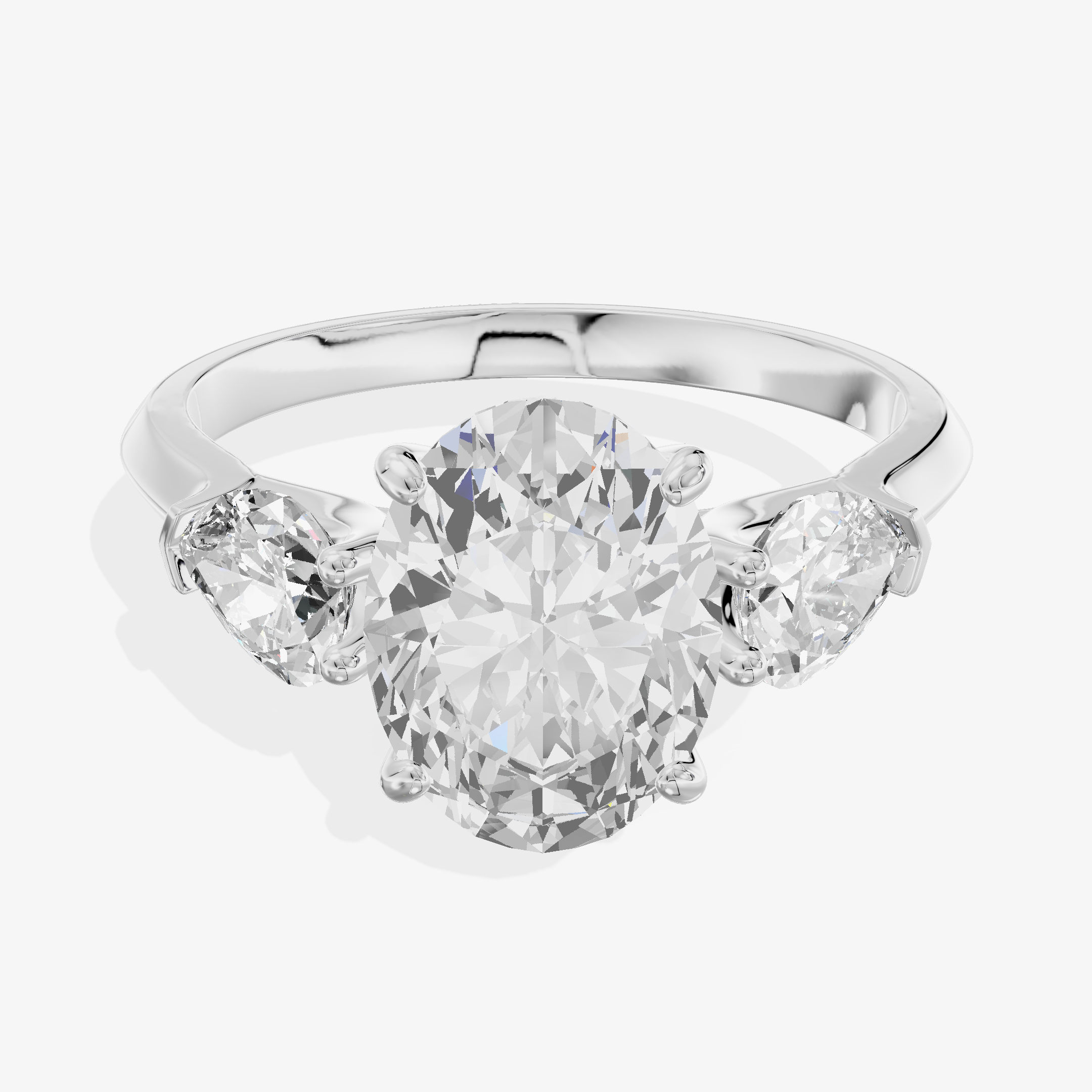Platinum 3.10 Carat Oval Cut Lab-Grown Diamond D VVS2 Three-Stone Ring with Pear Side Stones