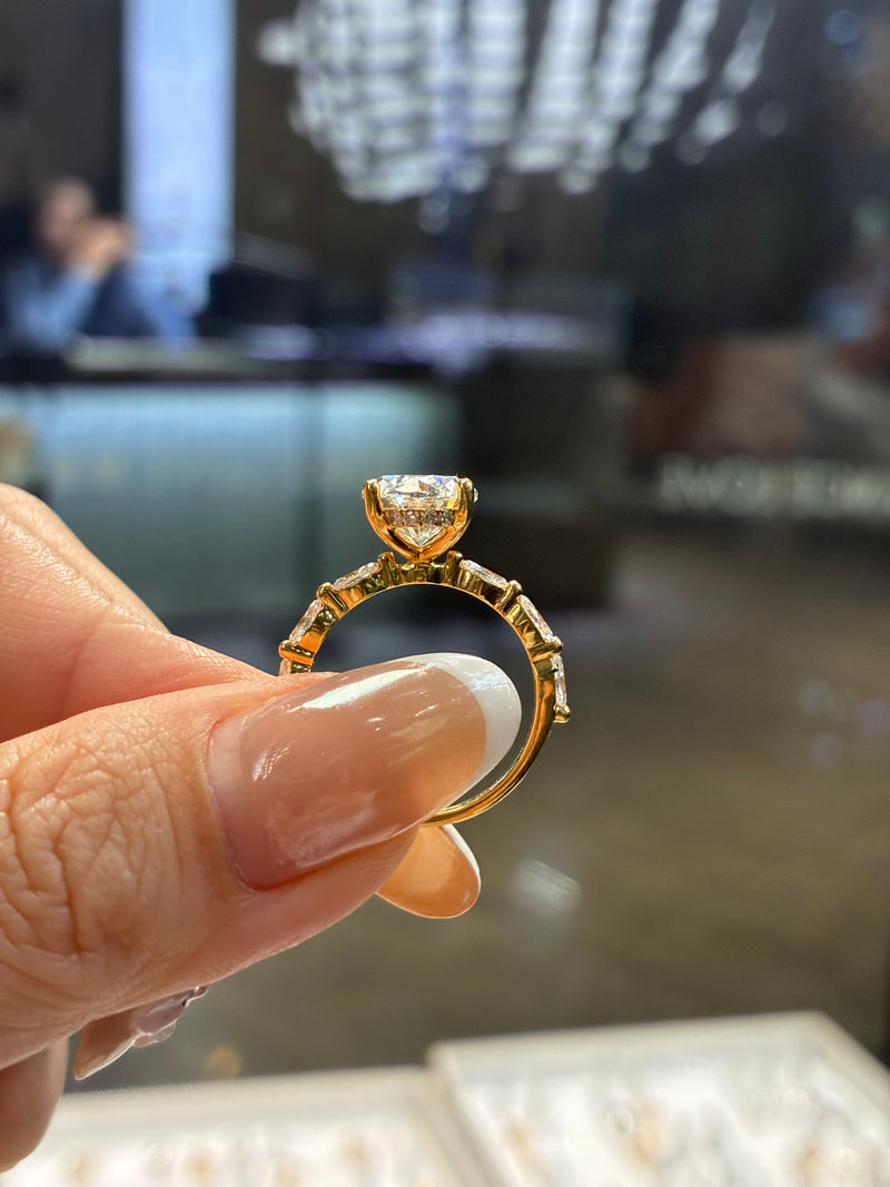 For Jodie, Deposit for 3.5ct Oval mainstone with 0.577ct sidestones, D/VVS2, in 14k yellow gold
