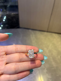 For Adriana 18K yellow gold 5.05ct Radiant cut E vS 1 with 1.05ct side stones