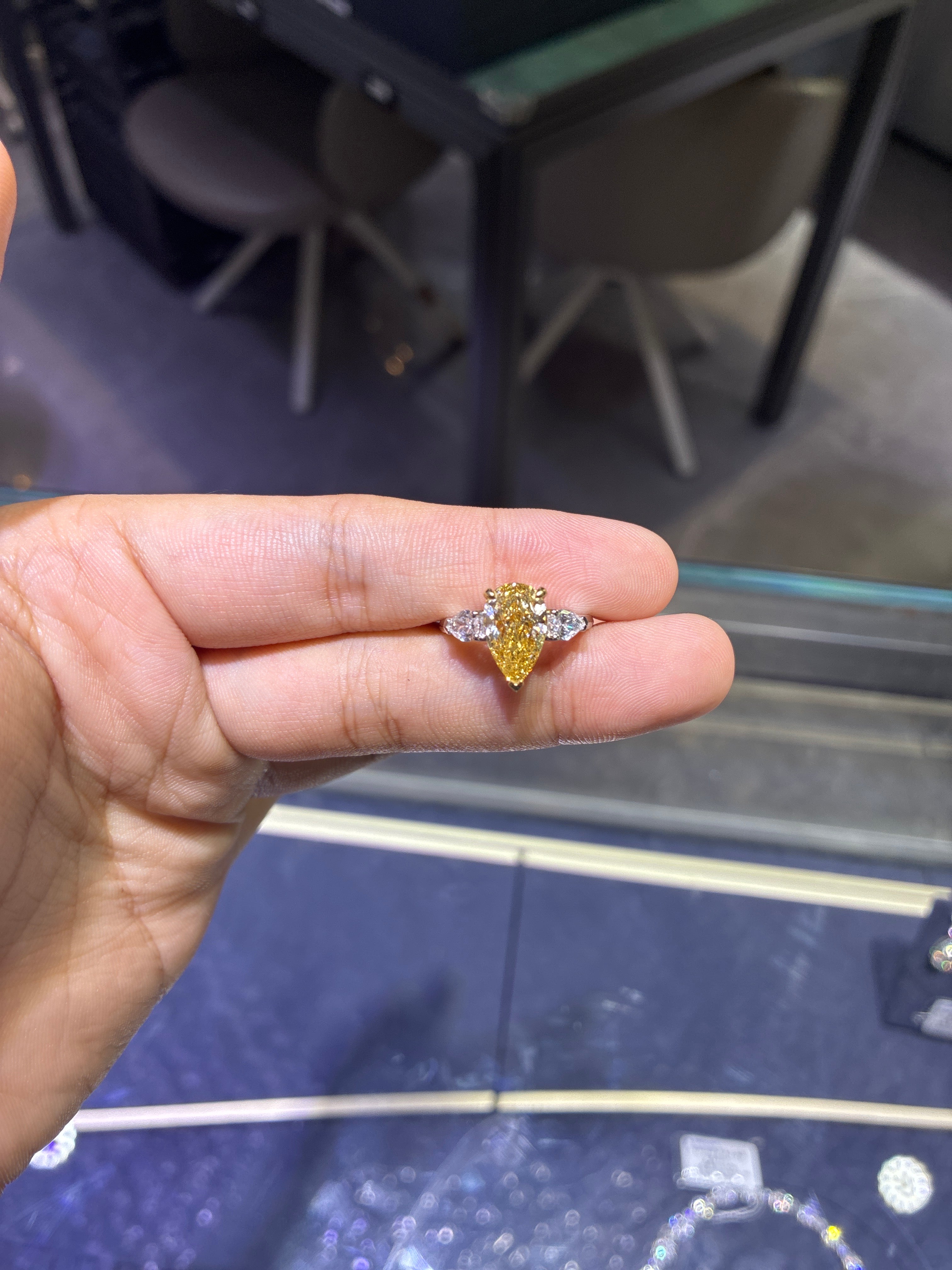 Adding hidden halo For Tammy Sholes230 14k white gold 3stone ring with 2ct pear cut yellow diamond
