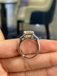 Deposit for jessika_paz_ 14k white gold, 5ct fancy yellow radiant main stone, 0.4ct side stones for both emerald stone, size 9