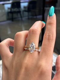 For Andrea                                 •14K solid gold 2.51ct E/VVS2 with 0.05ct side stones(ready to ship).                                           •14k solid gold with 0.50cr marquise with round bubble band(custom)