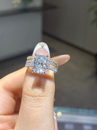 For mg a set 14k white E/vs1 main stone 3.02ct radiant cut + two bands