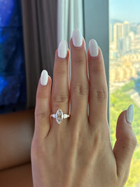 For Dana 14k 2.01ct marquise E/VVS2 with 0.479ct sidestones