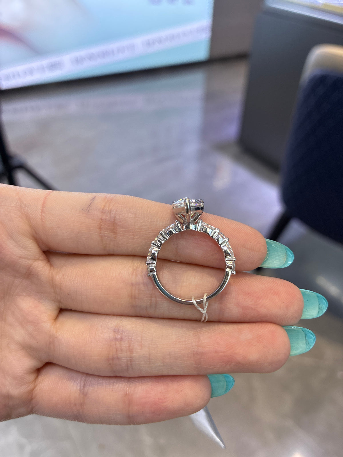 Deposit For Onetaxlady 1.5 carat pear cut D VVS2 with marquise side stones 14k white gold