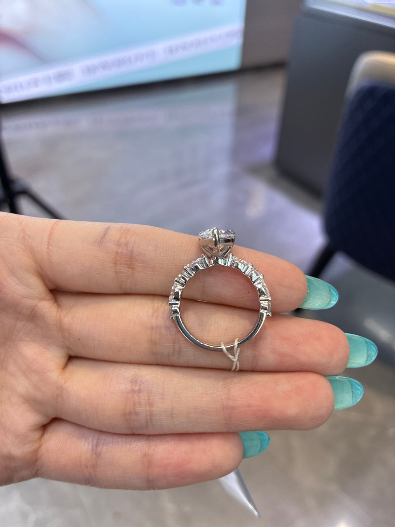 Deposit For Onetaxlady 1.5 carat pear cut D VVS2 with marquise side stones 14k white gold