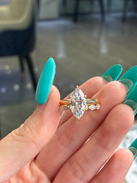 For Andrea                                 •14K solid gold 2.51ct E/VVS2 with 0.05ct side stones(ready to ship).                                           •14k solid gold with 0.50cr marquise with round bubble band(custom)