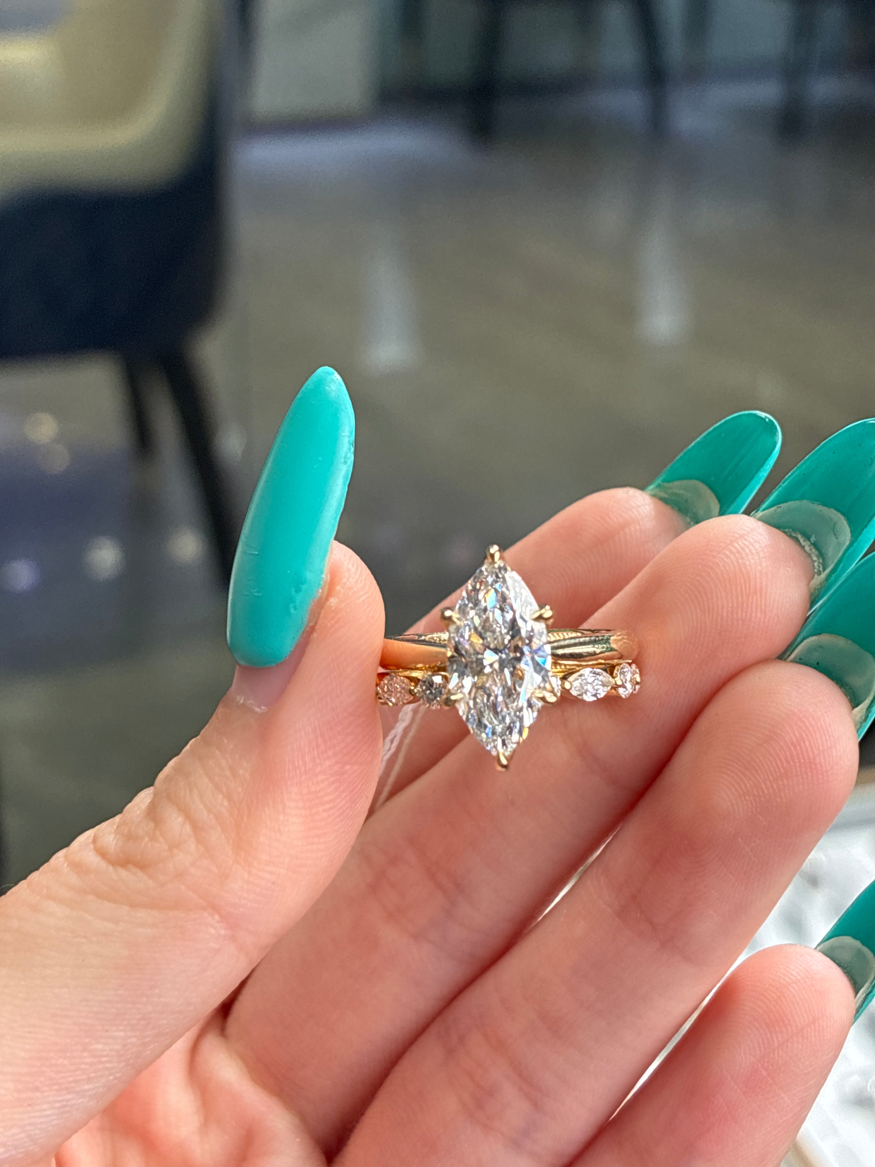 For Andrea                                 •14K solid gold 2.51ct E/VVS2 with 0.05ct side stones(ready to ship).                                           •14k solid gold with 0.50cr marquise with round bubble band(custom)
