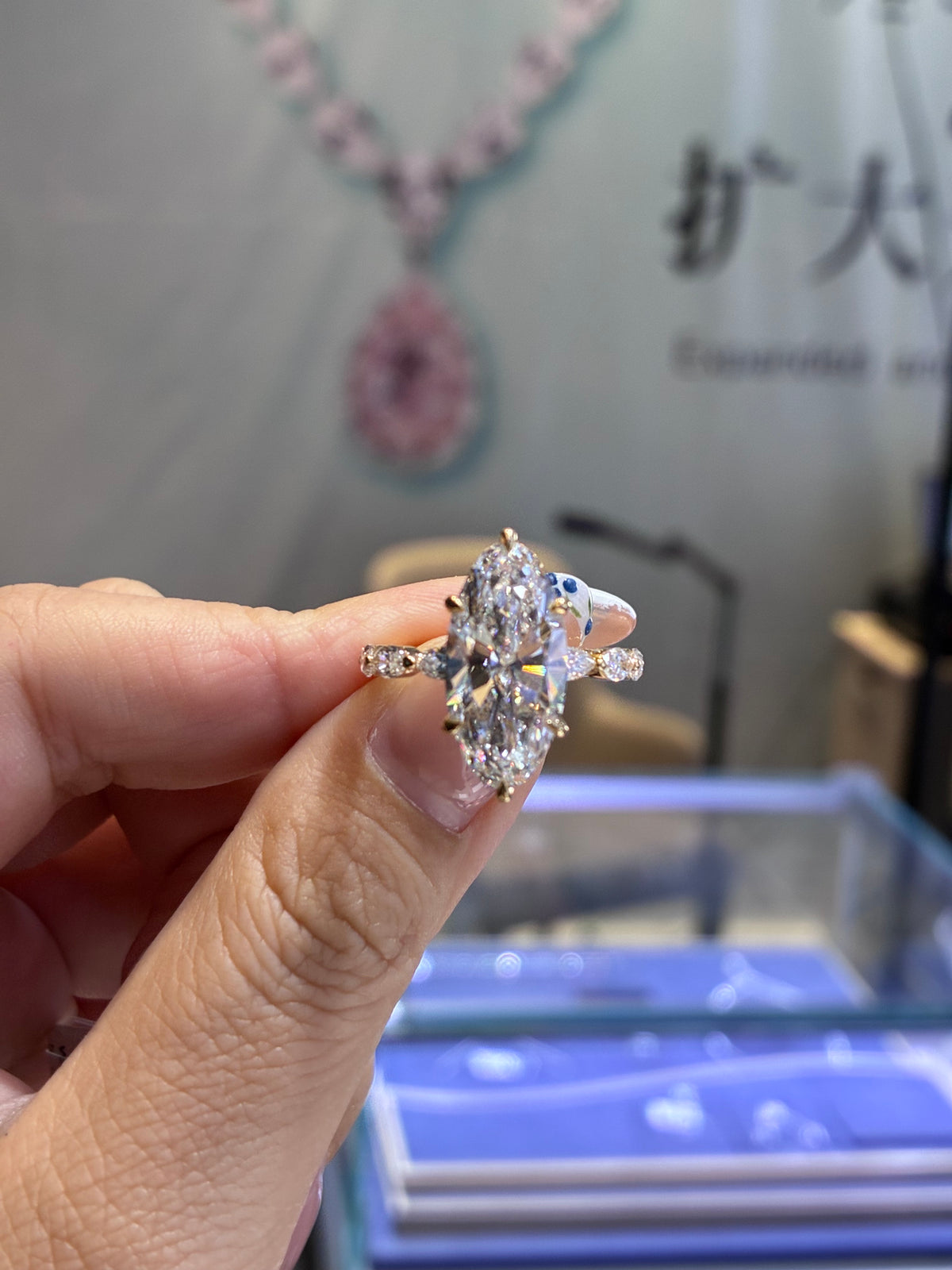 For Bless, deposit for 5ct Moval, E/VS1 with 1ct sidestones in 14k yellow gold
