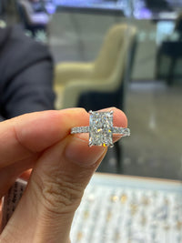 For Cyan Radiant 3.03ct in 14k white gold with 0.56ct sidestone