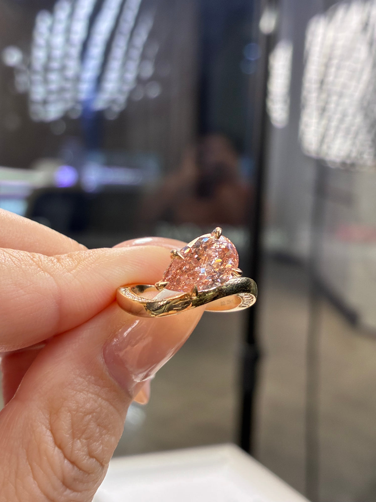 For Miabella, 2.29ct pink pear diamond with 0.64ct sidestones ring, Fancy Vivvd Pink/VVS2, 14k Yelloe gold