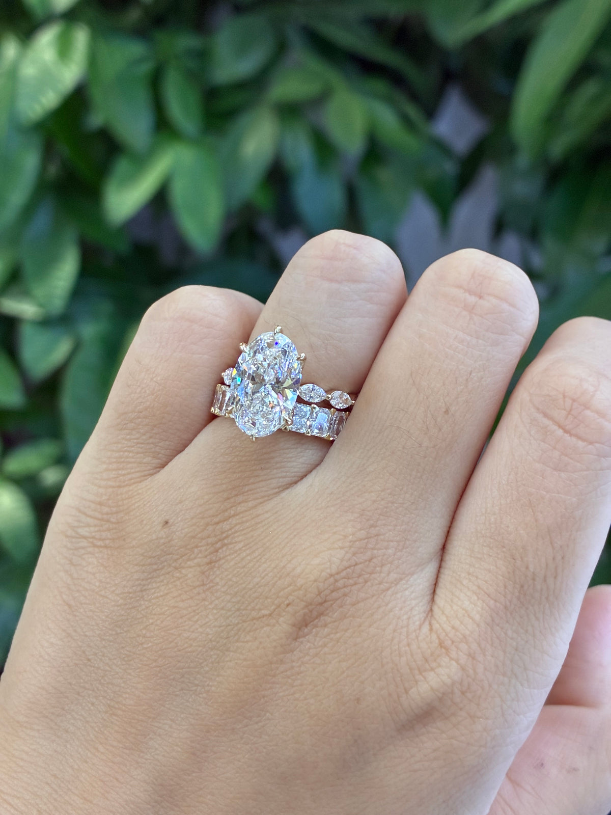 For Maddie, Bridal set, 5.01 Oval with 0.897ct sidestones Engagement Ring in 14k yellow gold + 4.525ct Full Radiant Eternity Band in 18k yellow gold