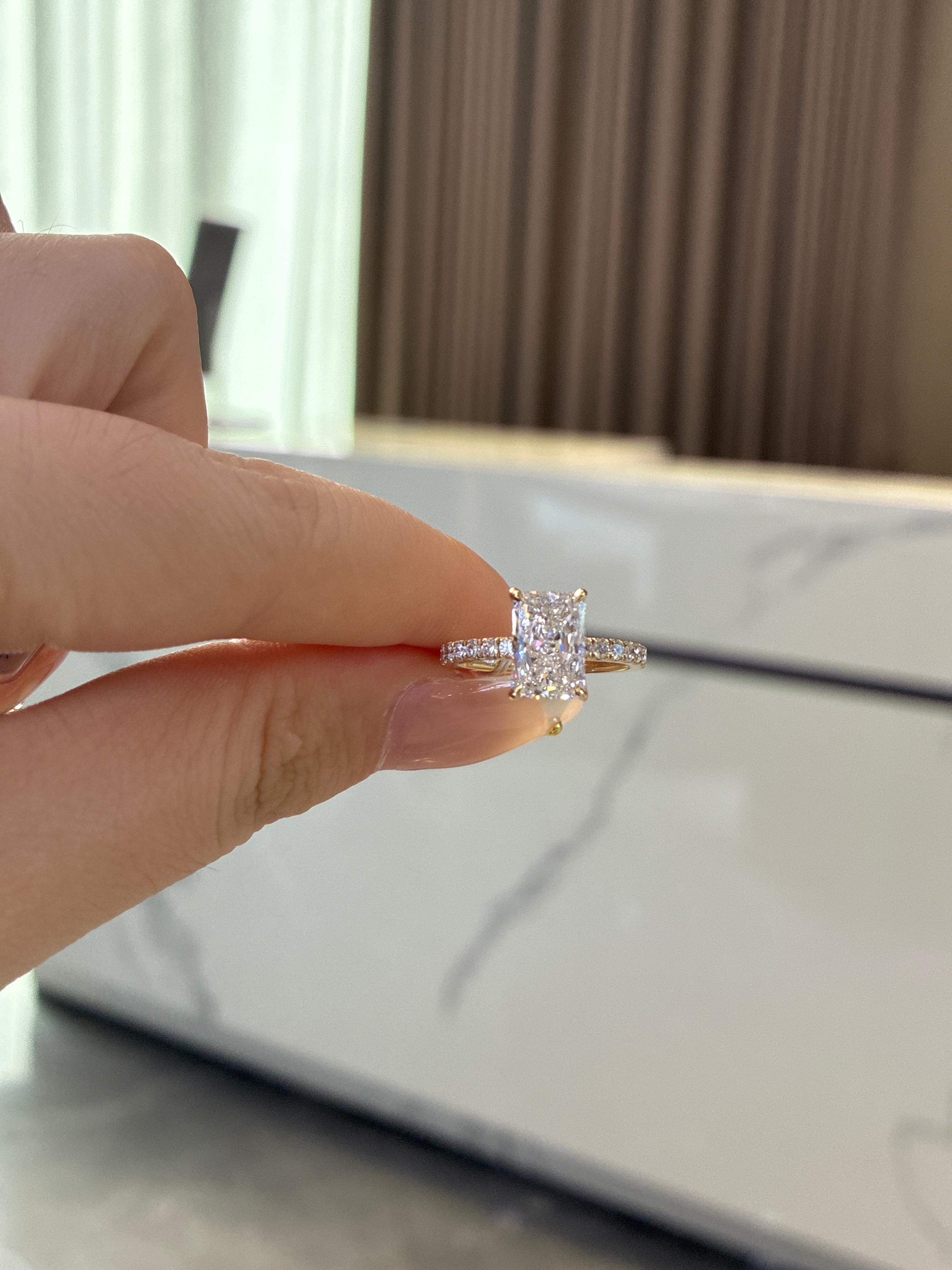 For cris 14k yellow gold radiant cut E/vs1 main stone 2.01ct side stone 0.307 ct