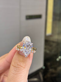 For Cathy, 5.03ct Pear Solitaire Ring + 0.569ct marquis Band E/VVS2 in 18k gold