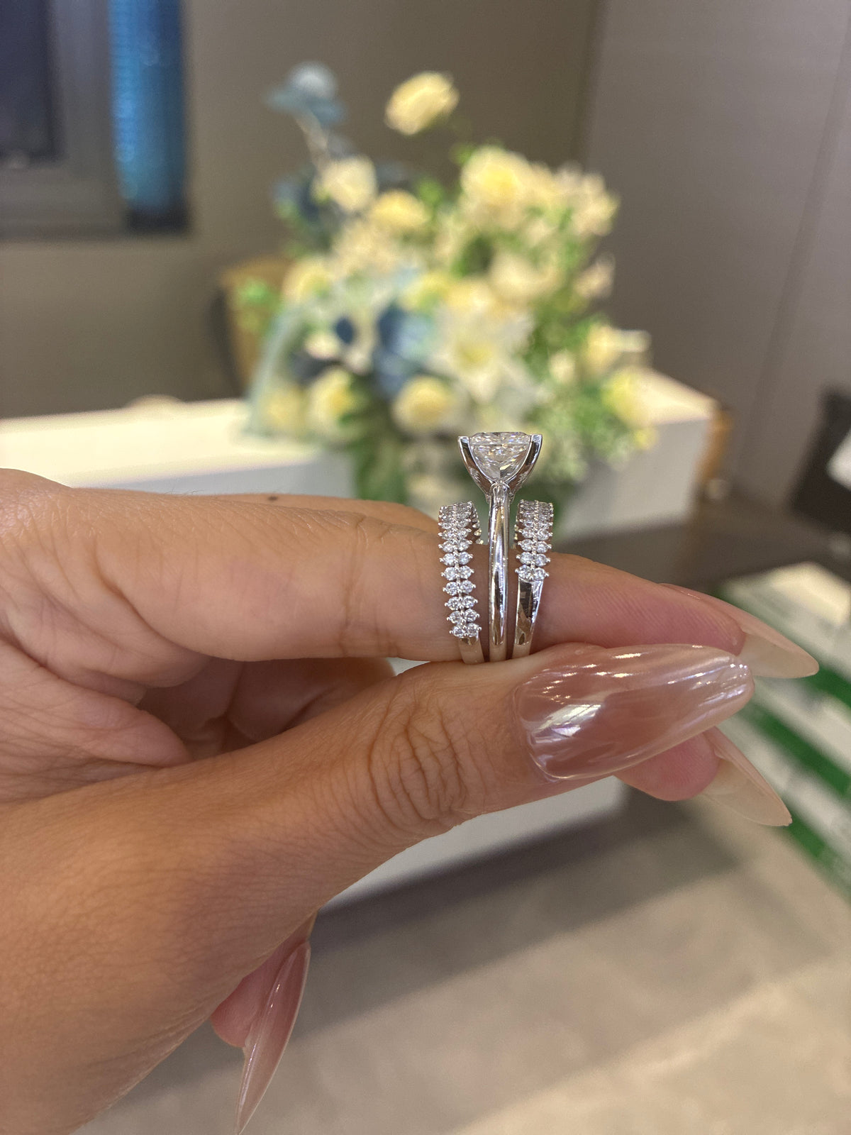 For gigi custom make 18k white gold ring with 3ct E vs1 main diamond And two 18k white gold band