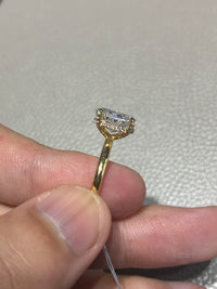18k gold oval 3.2 carats, hidden halo