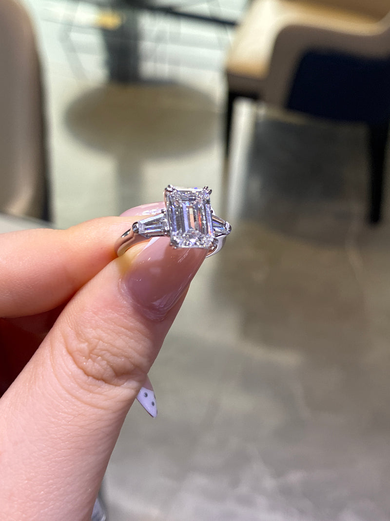 For chris platinum E/vs1 emerald cut 3.45ct side stone 0.497ct