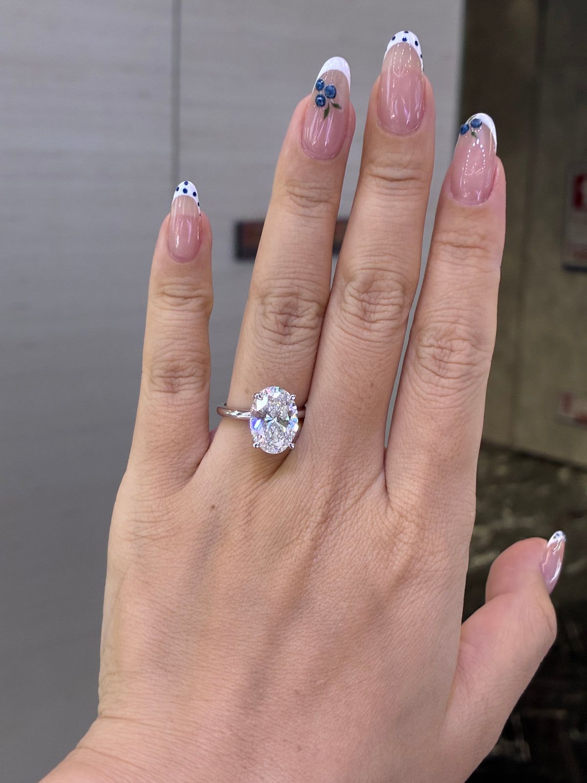 For Meg, 5.26ct oval lab Diamond with 0.308ct sidestones, D/VS1, in Platinum 950
