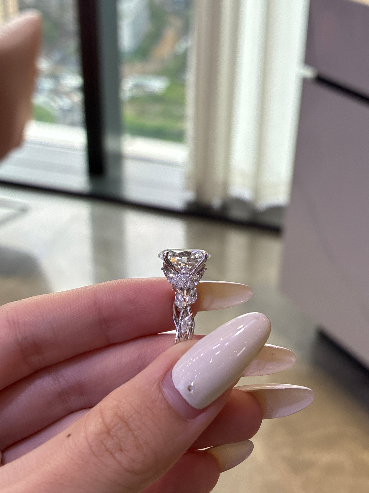 For ElevatedLux, 14k white gold setting only, designed to fit a 4ct radiant loose diamond, the side stones total 0.9ct. All the side stones are D–E color with VS–VVS clarity