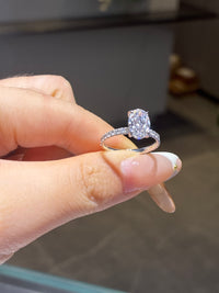For allouise 14k white gold oval wit hidden halo ,pave design customize with 1.00ct side stones