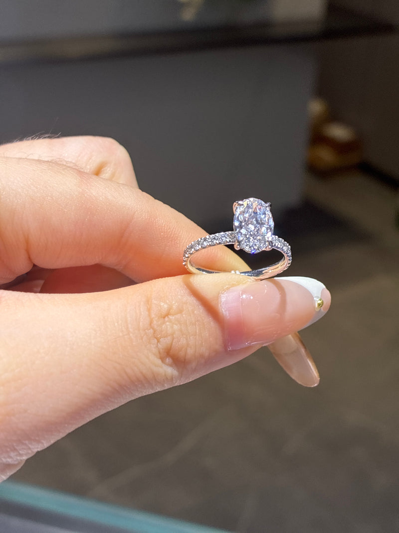 For allouise 14k white gold oval wit hidden halo ,pave design customize with 1.00ct side stones