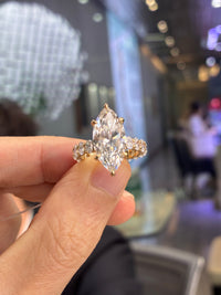 Deposit for Levi_joseph15 5.08 carats E/VVS2 marquis bubble band in 14k white gold with 2.532 carats of sidestones