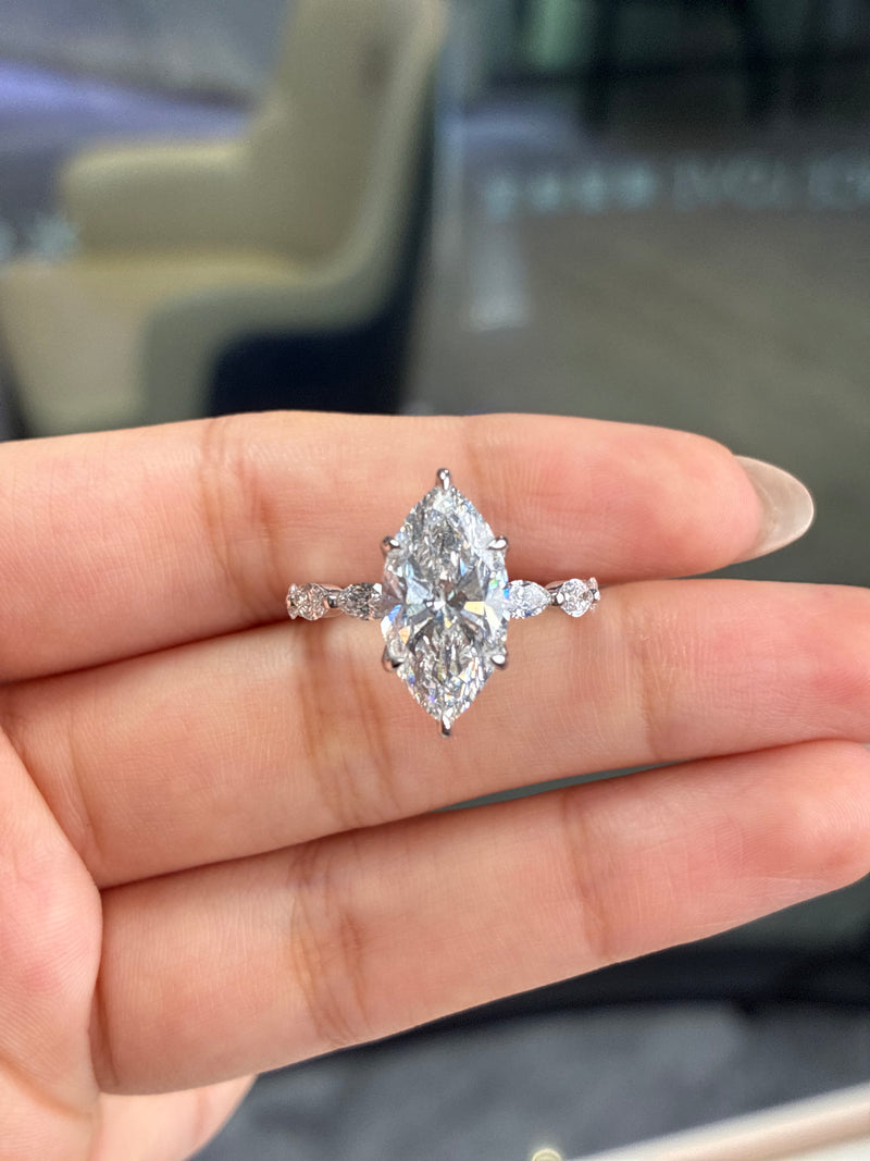 Deposit for aleisha 14k yellow gold, 5ct marquise cut main stone, 0.9ct side stone, around 3.5g gold weight. Size 7